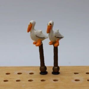 Pelican on a Post Cribbage Pegs